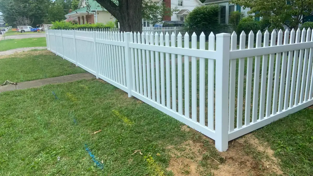 White vinyl picket fence