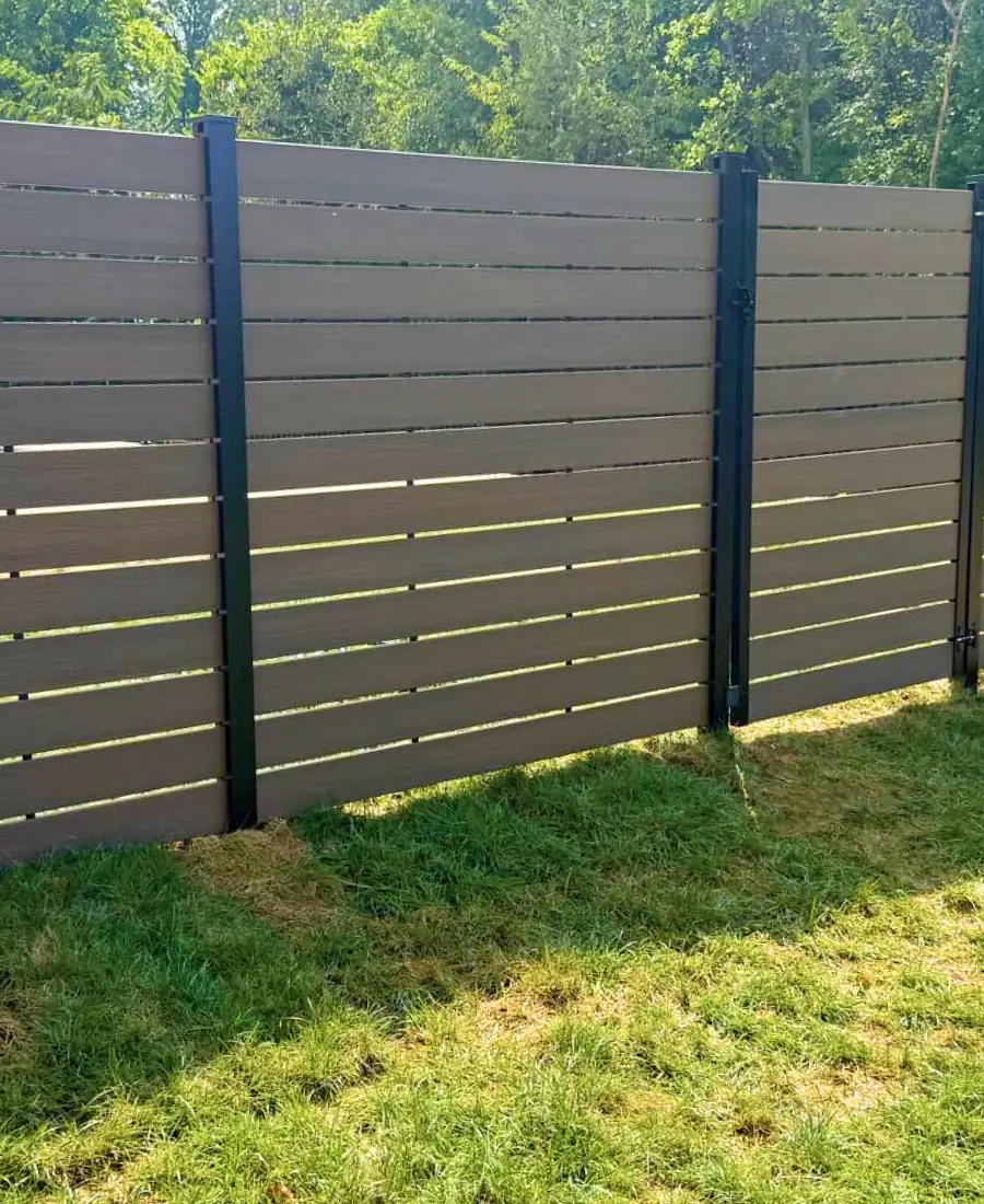 Stained horizontal slat fence with black posts