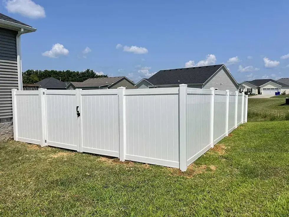 White vinyl privacy fence with gate