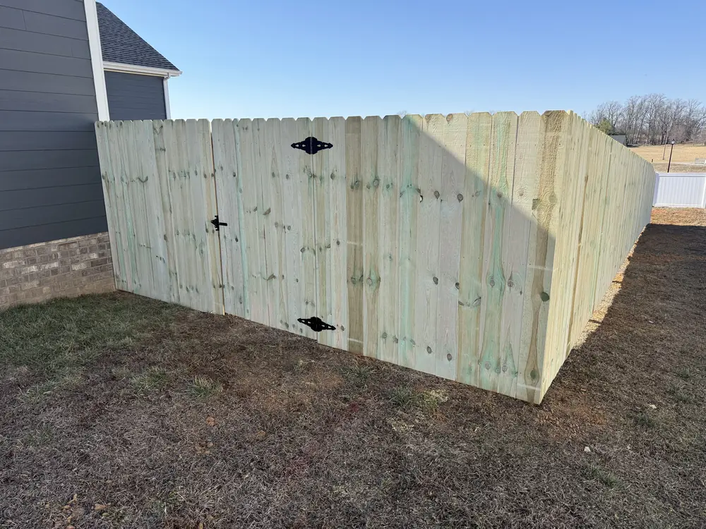 New pine privacy fence with a gate